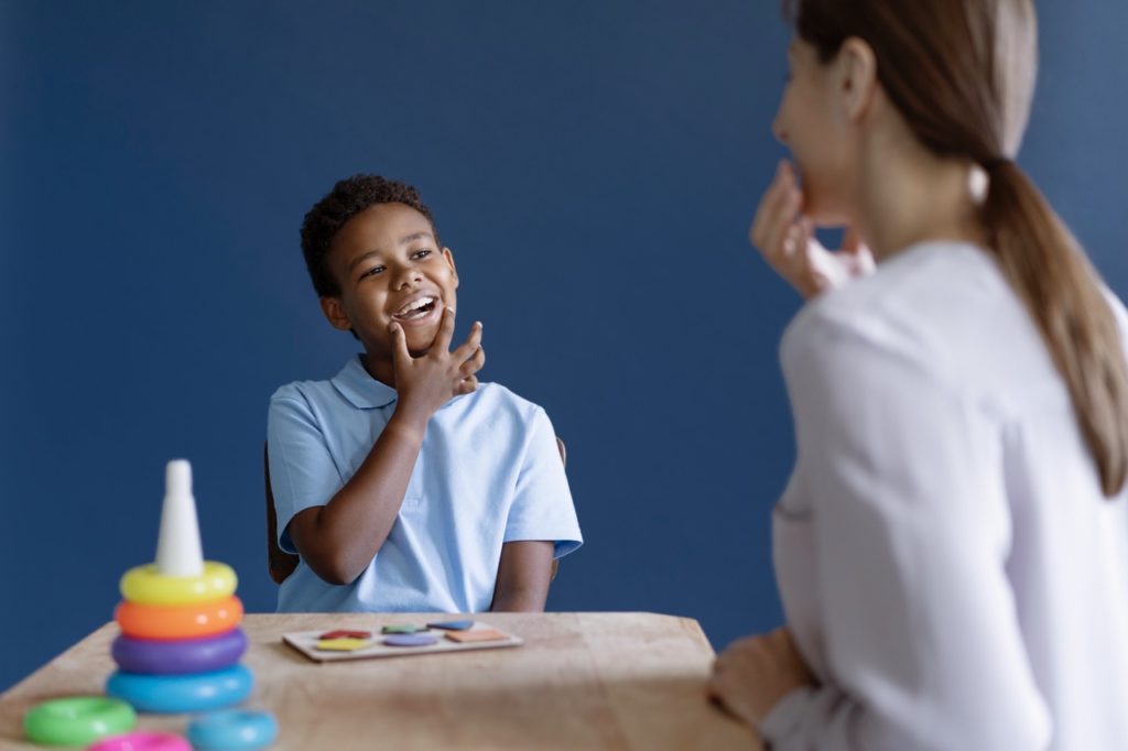 Behavioral therapist working with a child